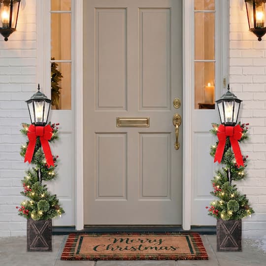 Puleo International 4ft. Pre-Lit Pinecones, Berries & Red Bow Artificial Spiral Lamp Post Trees, 2ct.